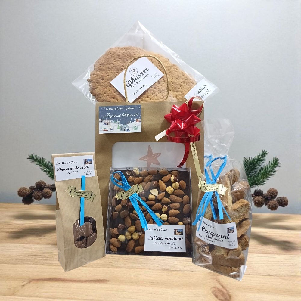 présentation de gourmandises de la maison griess dans un coffret noel